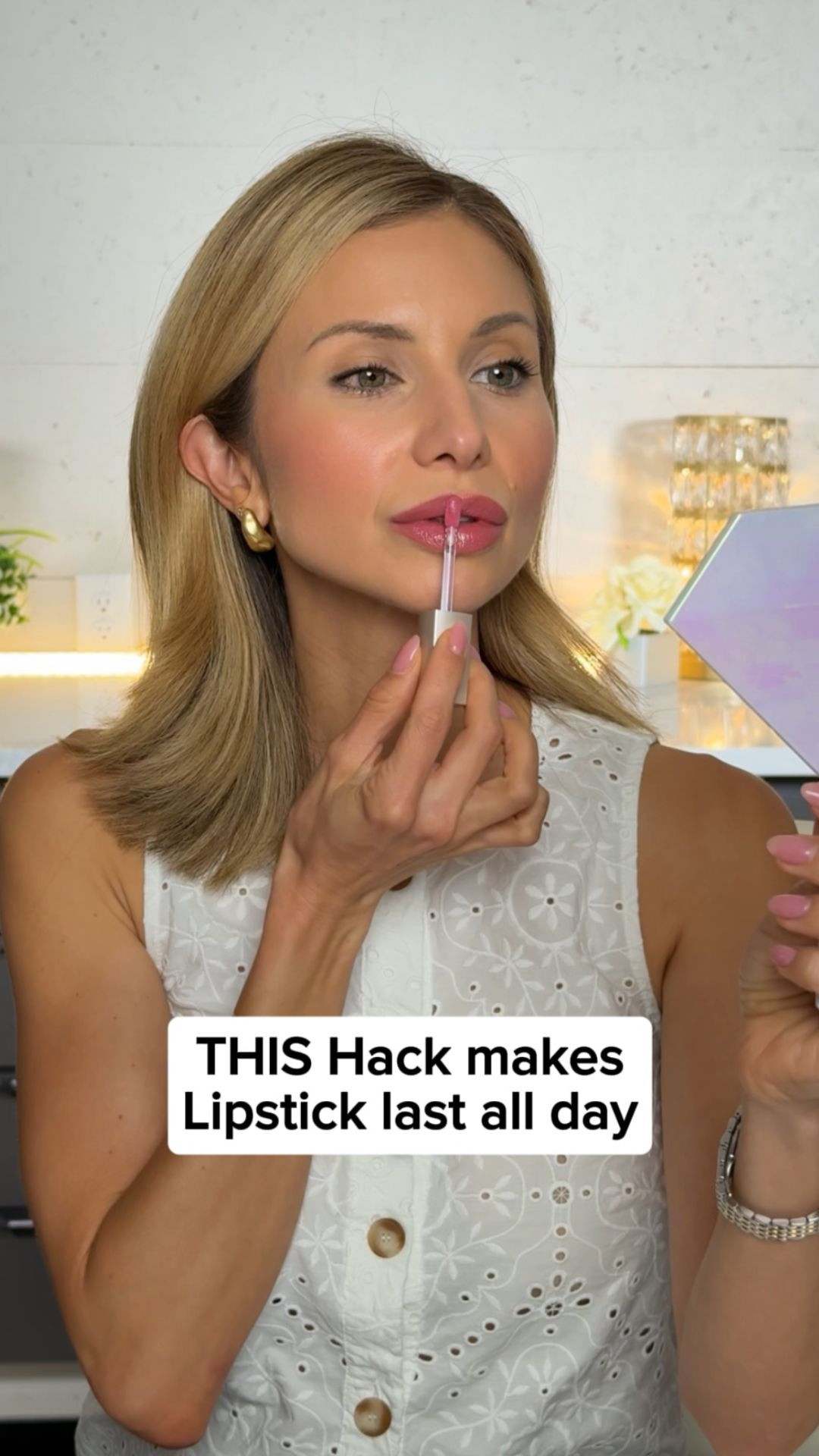 Makeup Hack 💄

Want Lipstick that lasts ALL day?

I learned this hack from Nikki
La Rose and it's a game changer. The secret; powder on bare lips before lipstick. It locks everything in so your color stays put, even through meals.
How I do it:
1. Press a little loose powder onto bare lips using the BK
Beauty x Nikki La Rose N14
Brush.
2. Apply lip liner for definition.
3. Add lipstick (it goes on smooth + stays put).
4. Finish with gloss for shine + plumpness.
Products I used:
BK Beauty, Nikki La Rose
N14 Brush
Jane Iredale, Lip Pencil -
Terra Cotta
Jane Iredale, Colorluxe Lip
Glaze - Flush
Clinique, Pop Shine Lipstick -
Nude Pop

#LTKOver40 #LTKBeauty