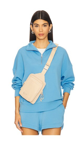 Hawley Half Zip Sweatshirt in Azure Blue | Revolve Clothing (Global)