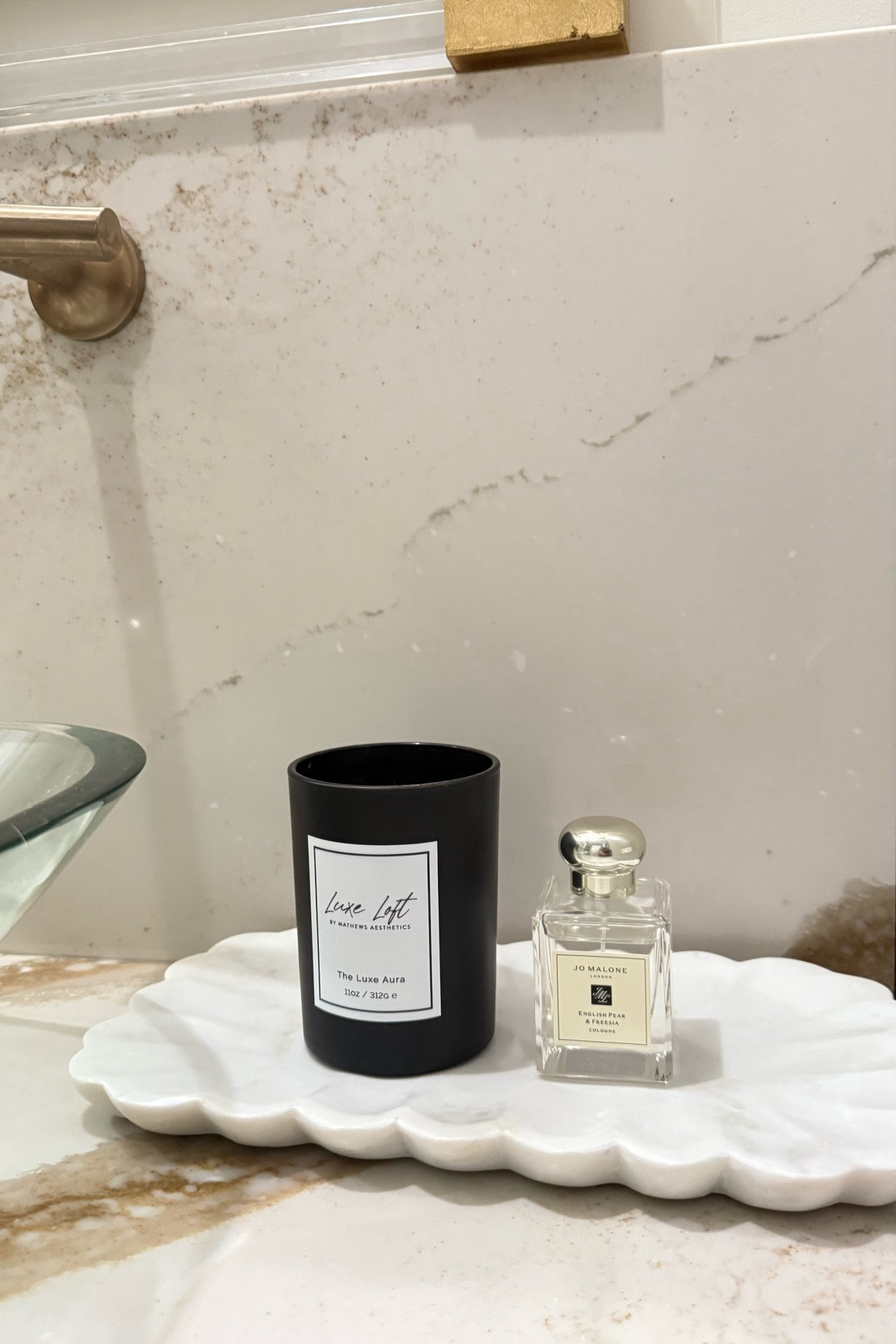Cutest addition to my bathroom is this Anthropology marble tray! Style anyway you want, love mine with my everyday perfume and a candle!

#LTKHome