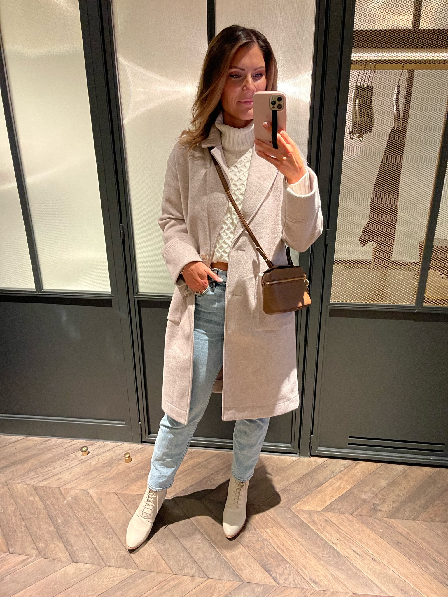 Paris outfit day 1! Jacket is gentle Fawn, sweater is old, bag is Ela Handbags case clutch in hazelnut, jeans I wear a size 26 long.

#LTKstyletip #LTKunder100