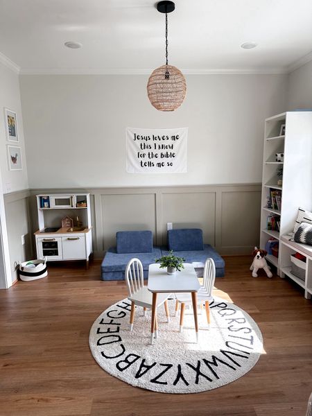 Playroom ⚡️ neutral kids playroom, Jesus loves me wall banner,  black and white decor, nugget couch, ikea kitchen

#LTKkids #LTKfamily #LTKhome