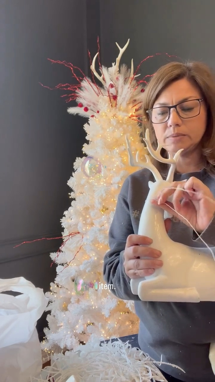 I’m mapping out my deer and sleighs on my white flocked dining room tree! 🦌🎅 These pieces are the focal points of this design, so placement is everything. I’m using white wire to secure them perfectly in the branches (because details matter 😉).

This tree is lit with clear wire lights — one cluster light on the trunk and three snake lights on the branches — for that full, glowing look I love. 💡

Follow for more Christmas decorating tips and tricks this holiday season, and comment “Shop” for links to my favorite lights and designer ribbons! 🎄❤️

#Christmas  #ChristmasTree #Decorating #HolidayHangups #DesignerChristmasTree #FlockedTree #SleighRideInRed #ChristmasDecor #HolidayDecorIdeas #ChristmasLights #ChristmasRibbon #Clusterlights #snakelights