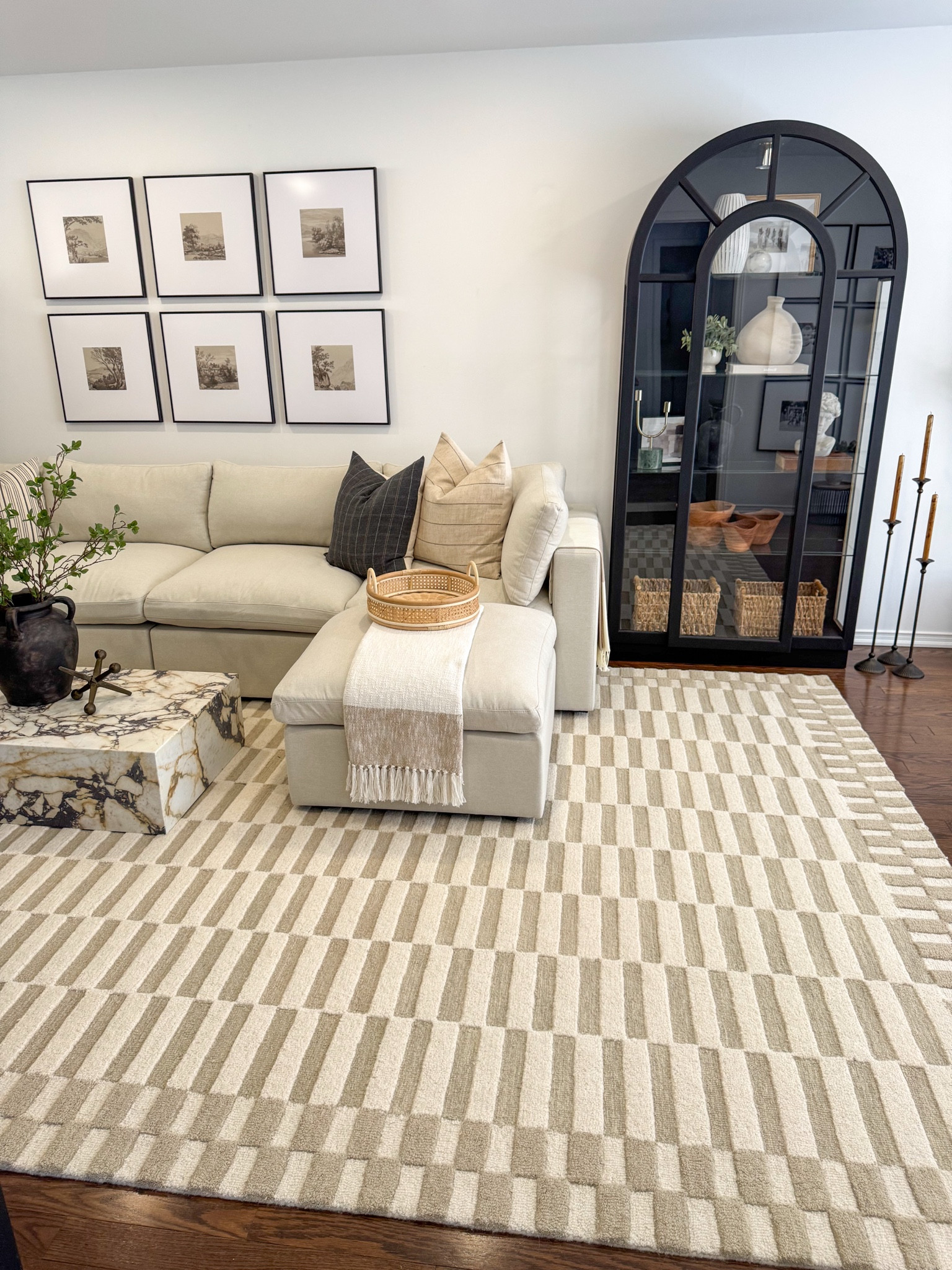 Shop my neutral, earthy and cozy living room!

#livingroom #arearug #gallerywall #coffeetable #throwpillows #cabinet #neutralhome #cozyhome #modernhome #fauxstems #vase

#LTKHome #LTKStyleTip