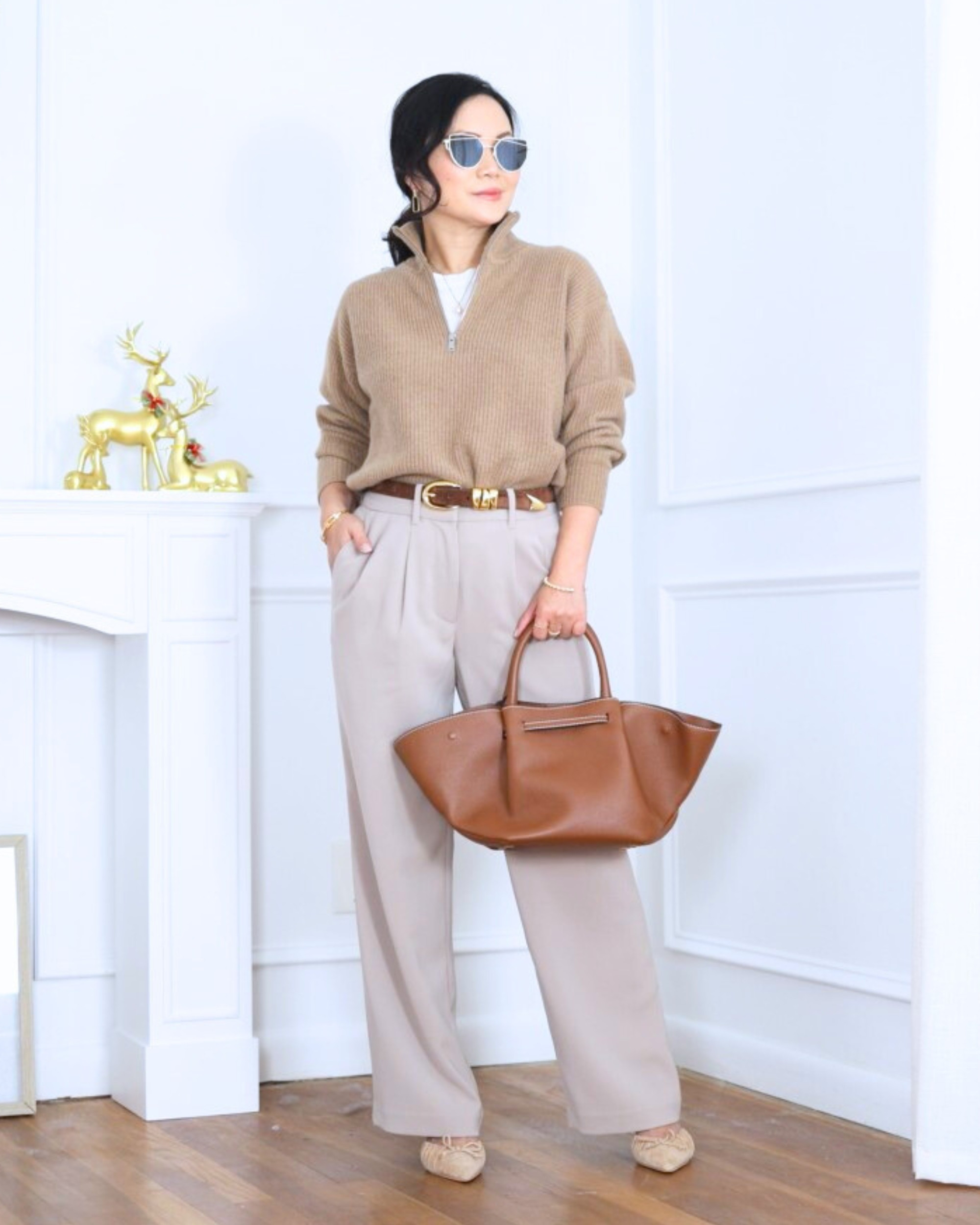 Quarter zip sweater layered over a white tee with pleated wide leg pants, all from Quince—clean, effortless, and the kind of outfit that feels put-together without trying too hard. I’m 5’2, wearing size XS.

#LTKootd #LTKOver40 #LTKPetite