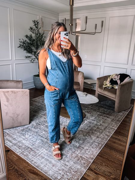 Free people denim jumpsuit that is bumpfriendly but non maternity! I got so many compliments in this and am able to wear my prepregnancy size small at 31 weeks! Also wearing the Amazon ribbed tank with removable padding under! 

#LTKStyleTip #LTKBump #LTKFindsUnder50