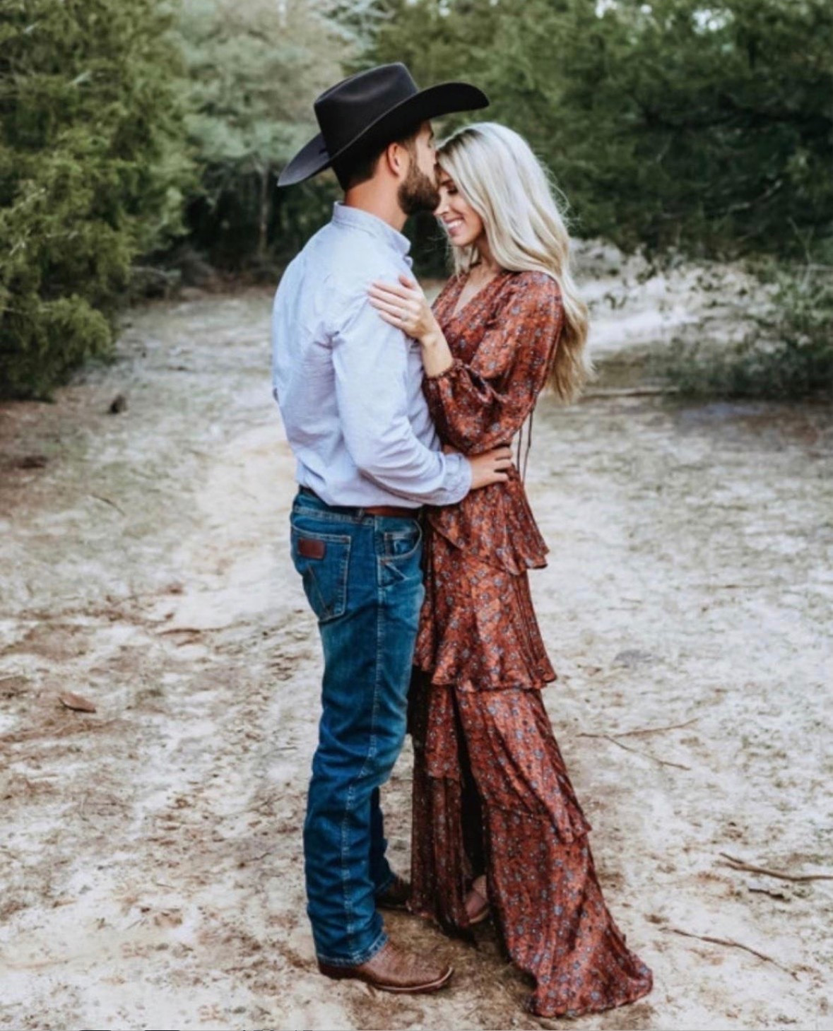 I just saw that my dress is back in stock just in time for fall family photos! I am obsessed with this dress! So slimming, just perfect in every way! I’m wearing size XS - I’m 5’6”, 118lb, 31B-25W-35H. Fall family photos, fall photos, fall dress, fall wedding guest dress, fall maxi dress, men’s wrangler jeans, men’s jeans, cowboy hat, cowboy boots. Callie Glass @glass_alwaysfull