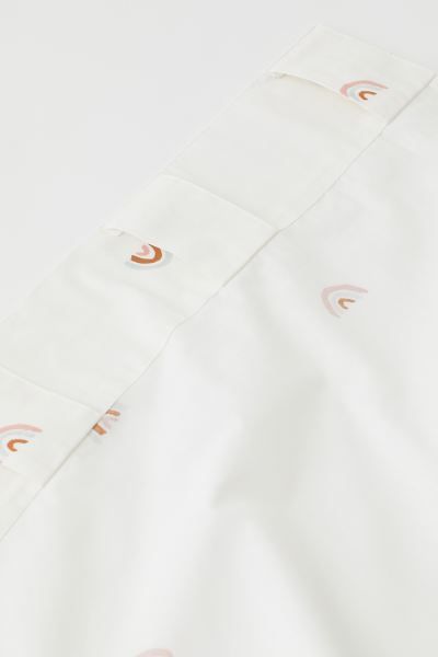 Curtain panels in woven organic cotton fabric with a printed pattern. Wide, cased heading. Hemmin... | H&M (US + CA)