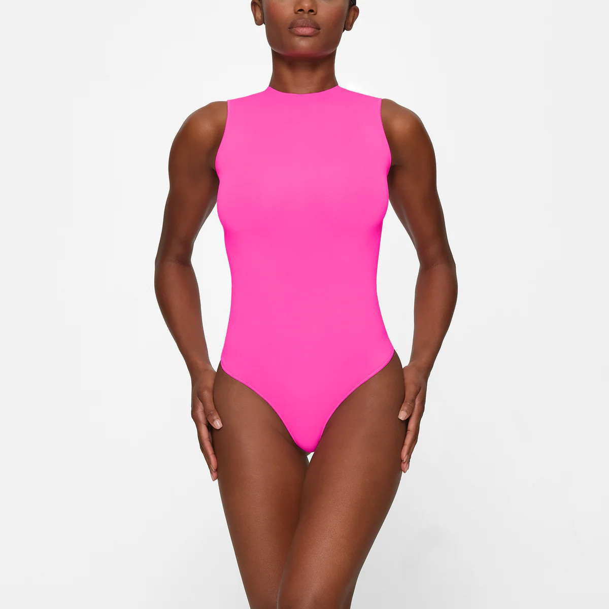 ESSENTIAL CREW NECK SLEEVELESS BODYSUIT | SKIMS (US)