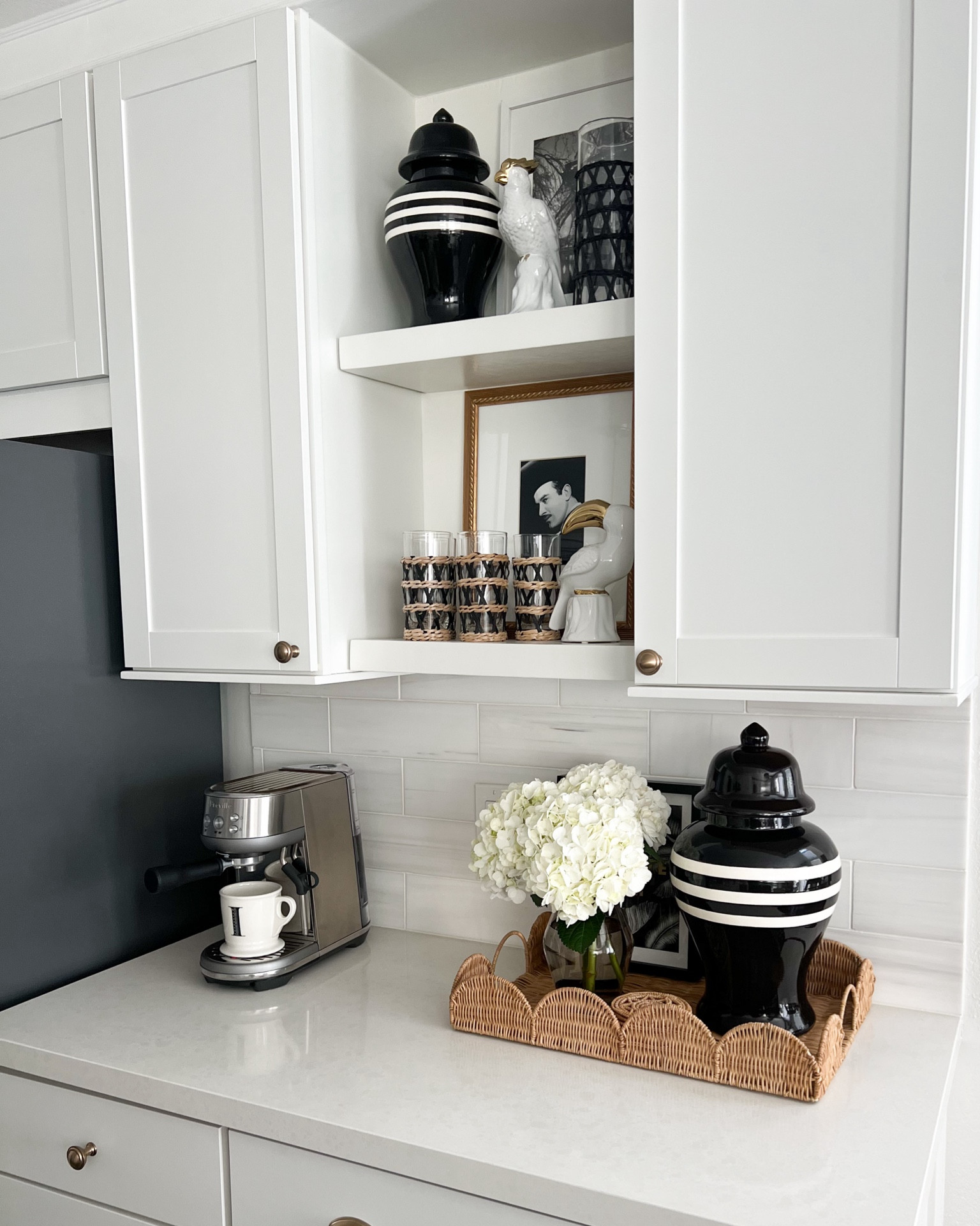 Kitchen decor. Expresso machine, rattan tray, vase, kitchen counter decor, custom ginger jar. 

#LTKHome #LTKSeasonal #LTKStyleTip
