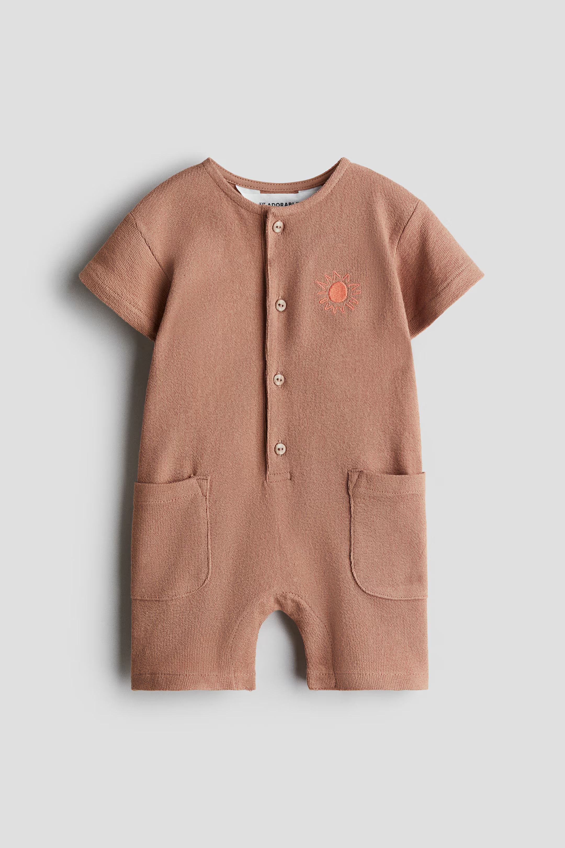 Cotton romper suit | H&M (UK, MY, IN, SG, PH, TW, HK)