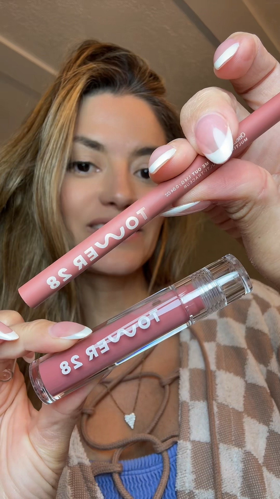 I’m wearing the color pistachio in the gloss and check me out in the lip liner. Tower 28 line and shine lip kit. ￼￼

#LTKBeauty #LTKmomlife