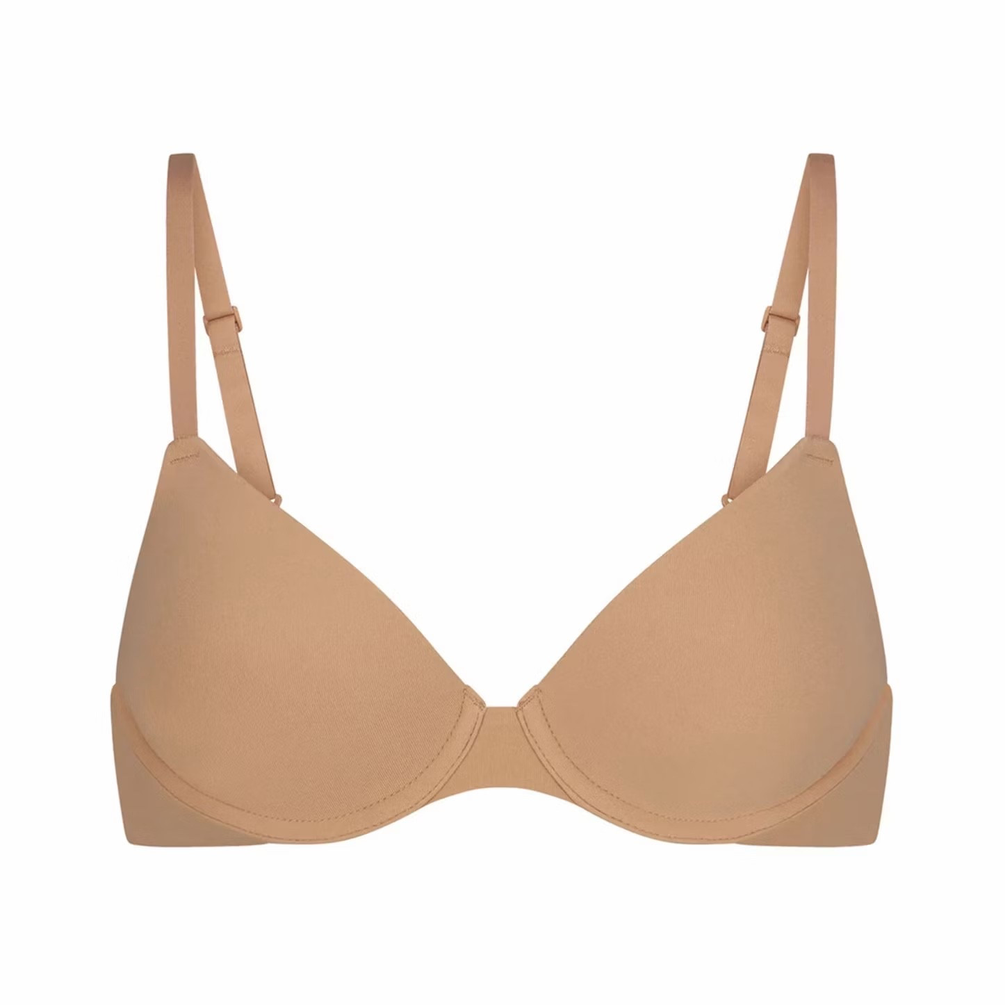 I get SO many questions about my bras lol - I LOVE this Skims t shirt bra. Truly the best!!! I’m a 34C in shade Ochre.
