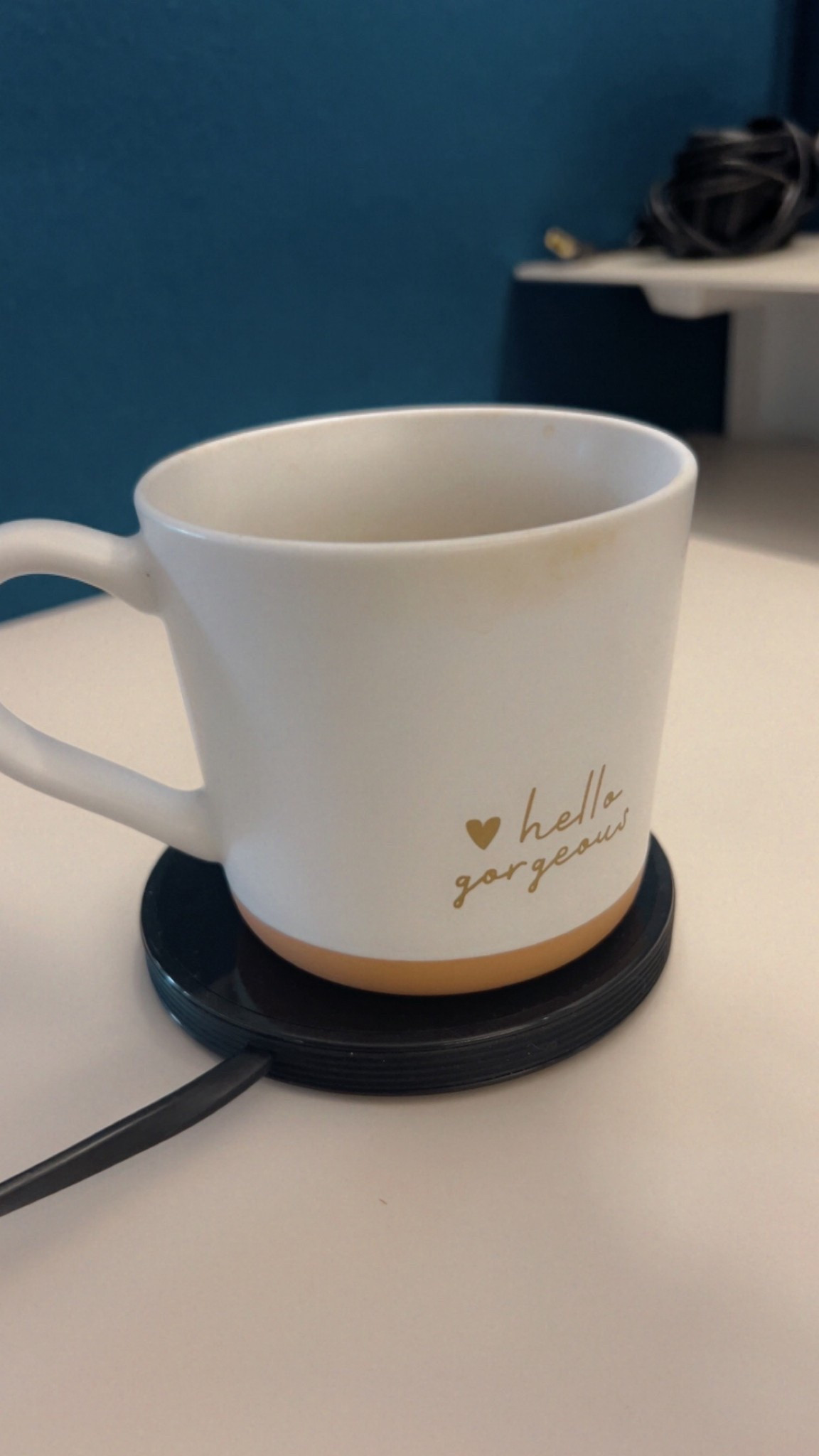 My mug warmer keeps my coffee hot because I hate when my coffee gets warm. It makes 
the perfect gift. 