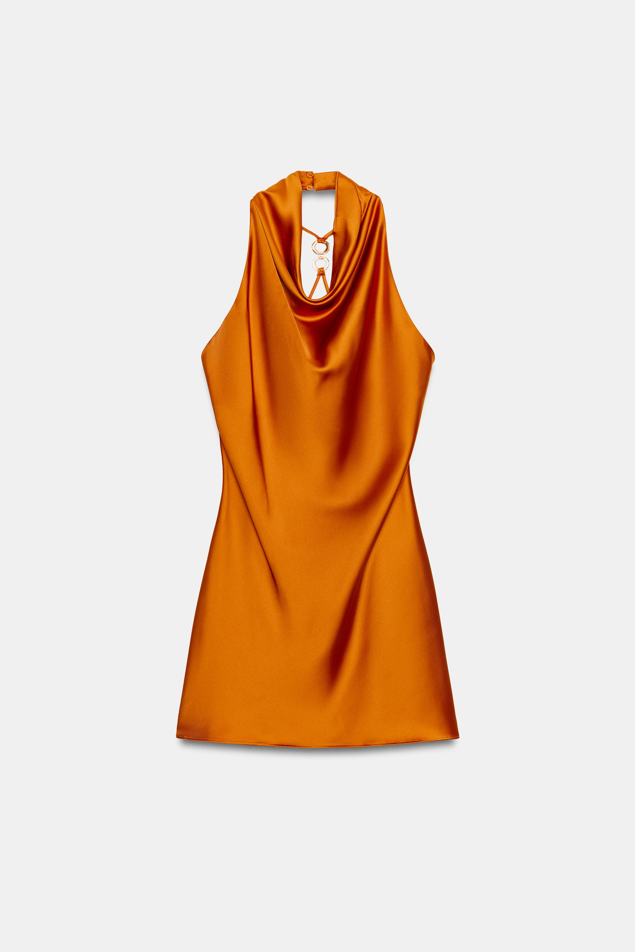 Short halter neck dress. Open back with thin straps and gold-toned ring details. | Zara UK