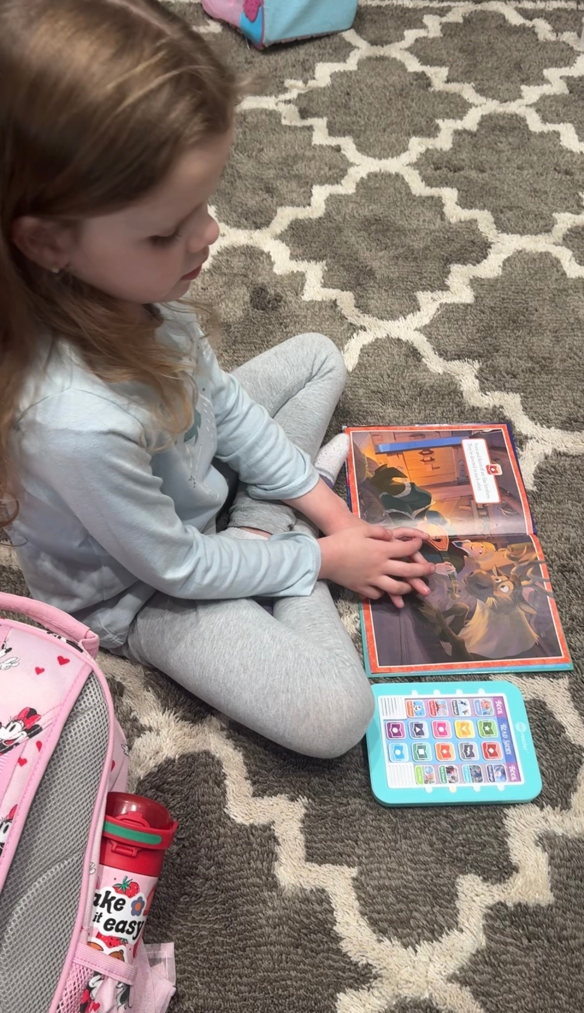 Electronic book reader that helps her learn the words!
