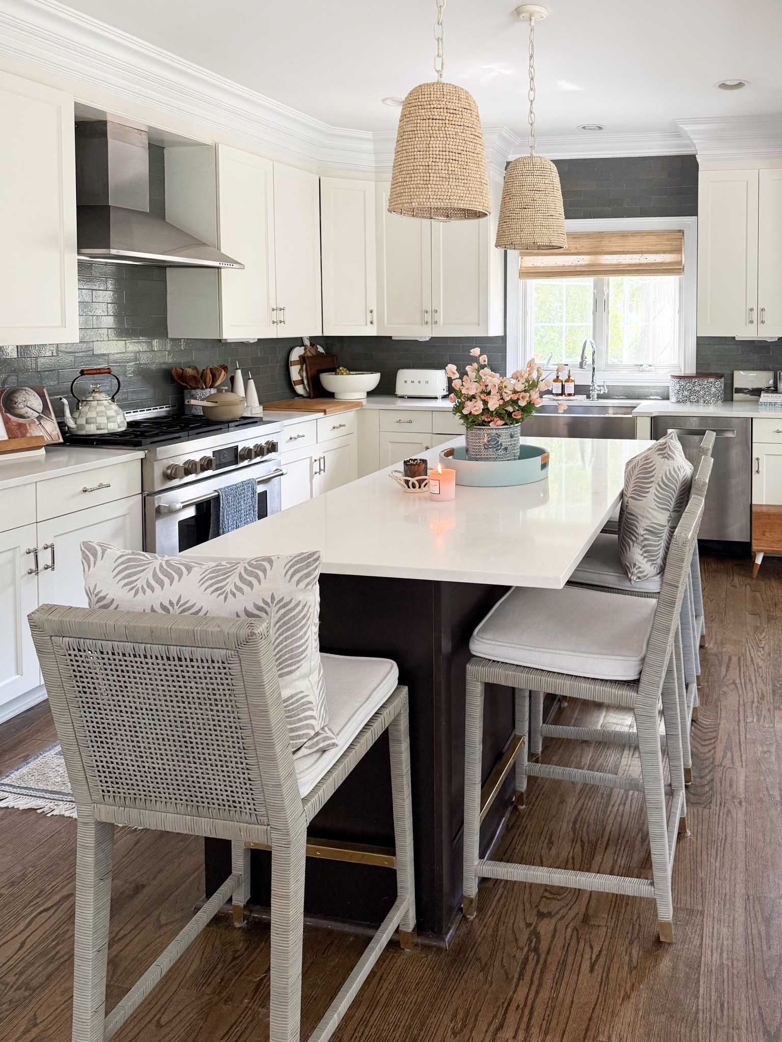 These woven pendants bring so much warmth and texture into our kitchen. They soften all of the bright finishes and help the island feel like the heart of the room. Kitchen pendant lights, woven lighting, kitchen island lighting, neutral kitchen, coastal style, home lighting ideas, kitchen decor, timeless interiors, GirlOnTheHudson

#LTKootd