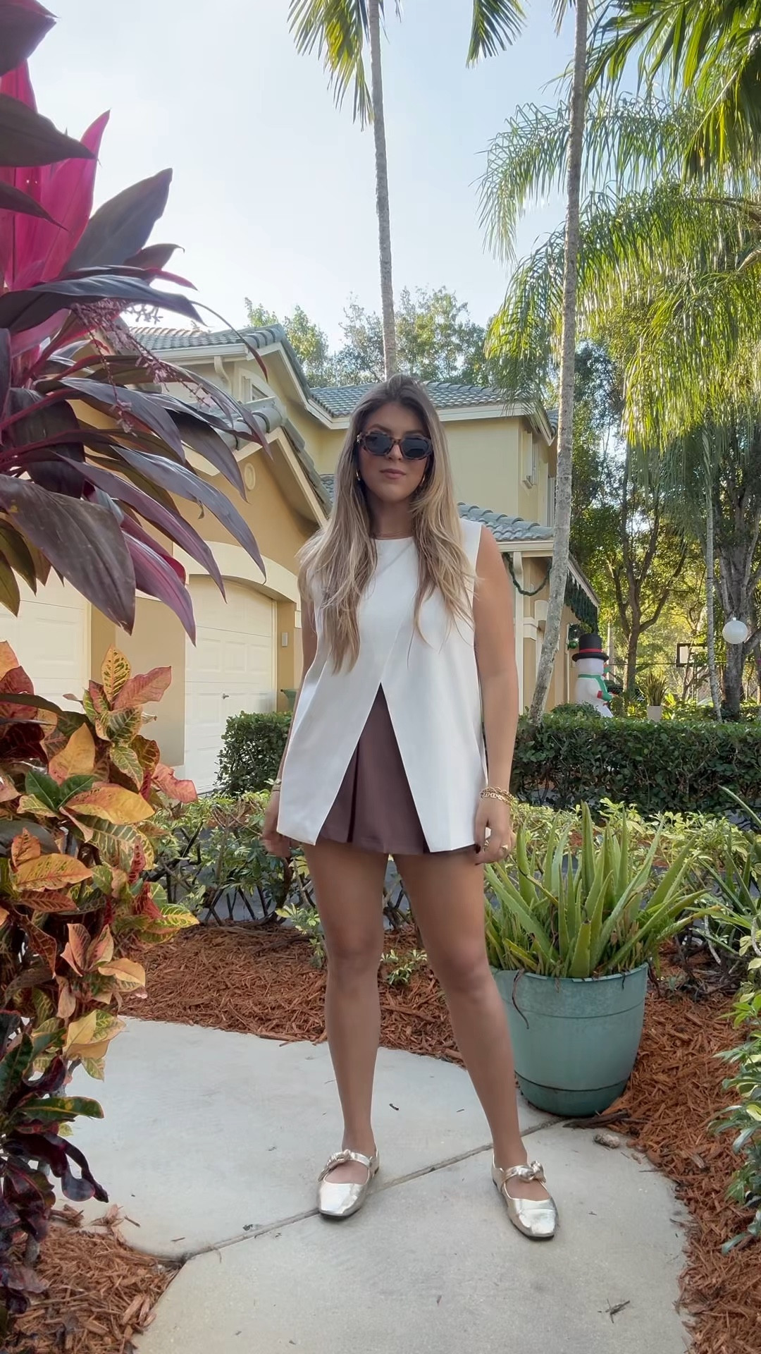 Thanksgiving vibes in a classic pleated brown skirt, crisp white blouse, and a touch of glam with gold flats. 🍂✨ Perfectly chic and comfy for hosting or hopping from table to table!🦃

#LTKFindsUnder50 #LTKMidsize #LTKSeasonal