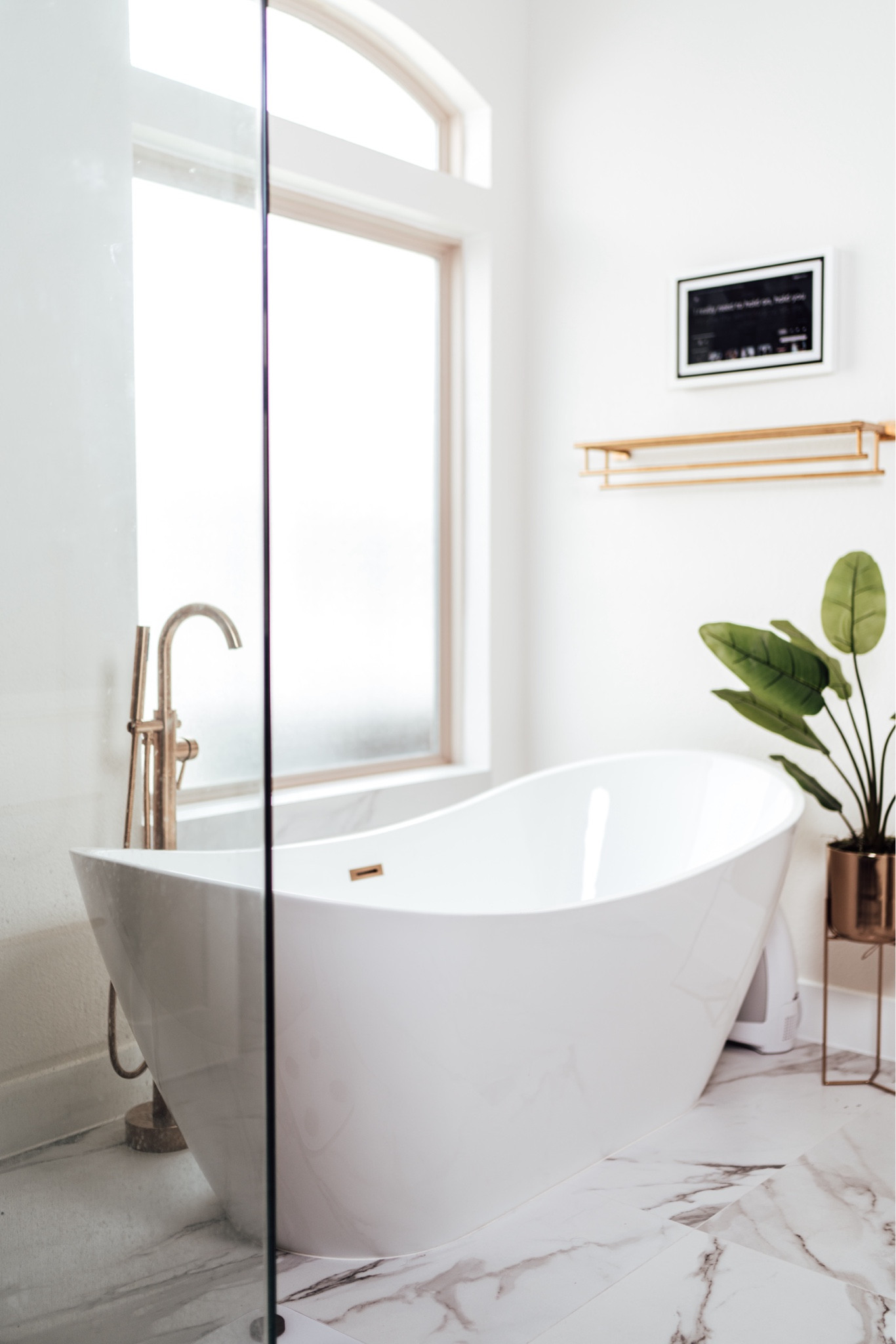 Luxury white & gold bathroom | Free standing bathtub | 

#LTKHome #LTKBeauty