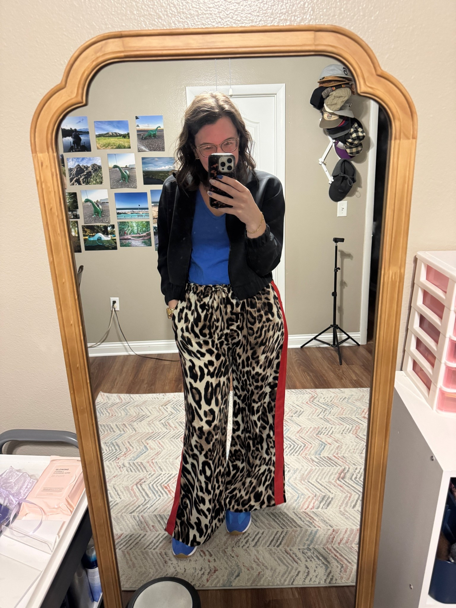 A fun travel day outfit. 

Leopard pants

Blue sneakers