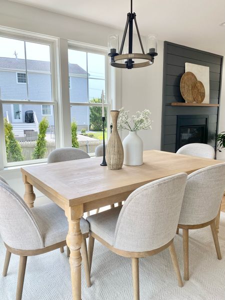 Rounded beige upholstered dining chairs.

#diningchairs

#LTKhome