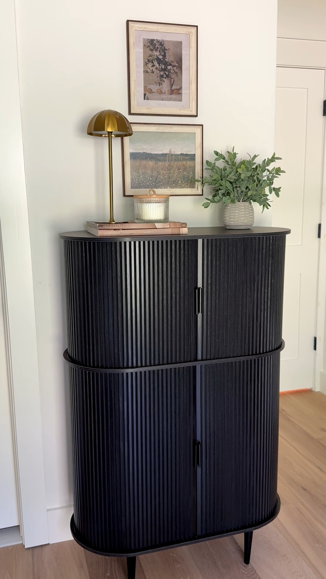 Sideboard. Wireless table lamp. Wall art. Buffet cabinet. Accordion cabinet. Black cabinet  

#LTKHome