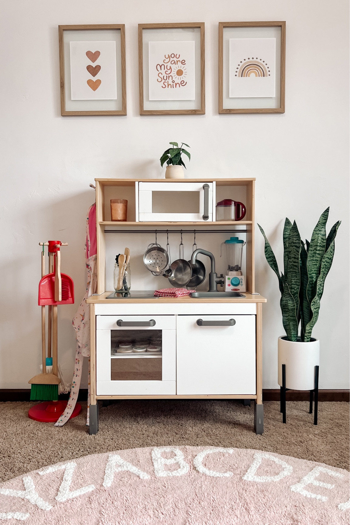 Simple kid’s space - the kitchen! This is our most coveted toy and is played with by both kids every day! All of our favorite kitchen accessories are tagged as well! I unfortunately couldn’t find the exact frames (they were from Target) so I tagged a few similar ones on Amazon! 

#LTKkids #LTKfindsunder50 #LTKMostLoved