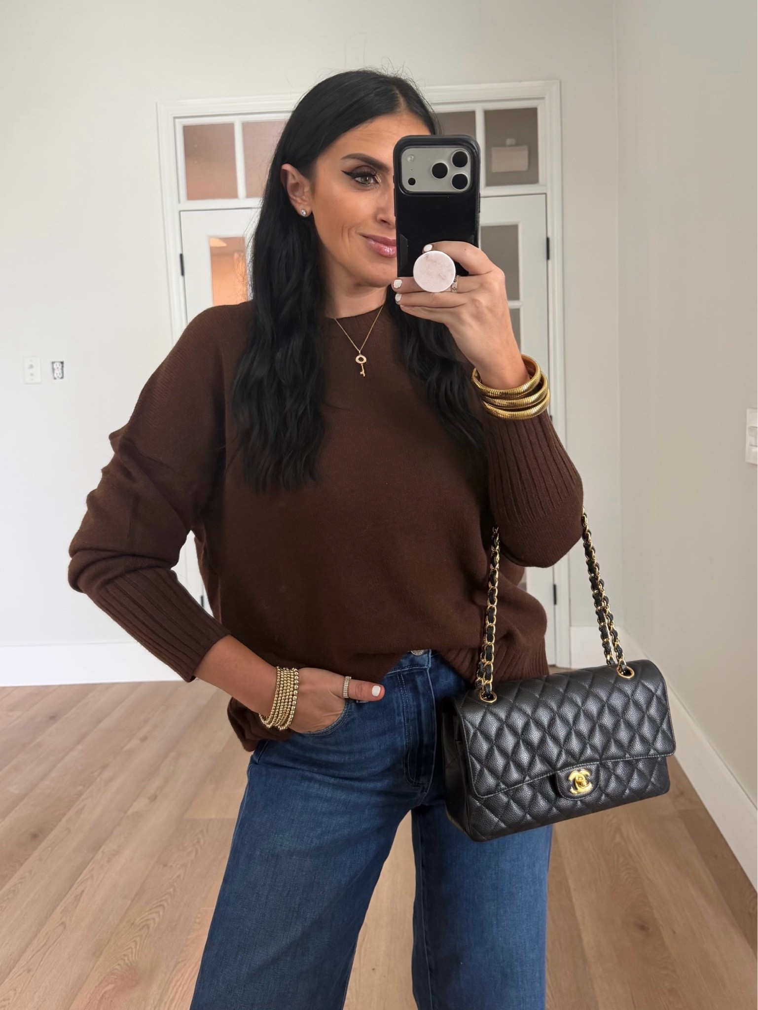 Pistola Kyra High Rise Flare Jeans. Oversized Sweater wearing size small.
