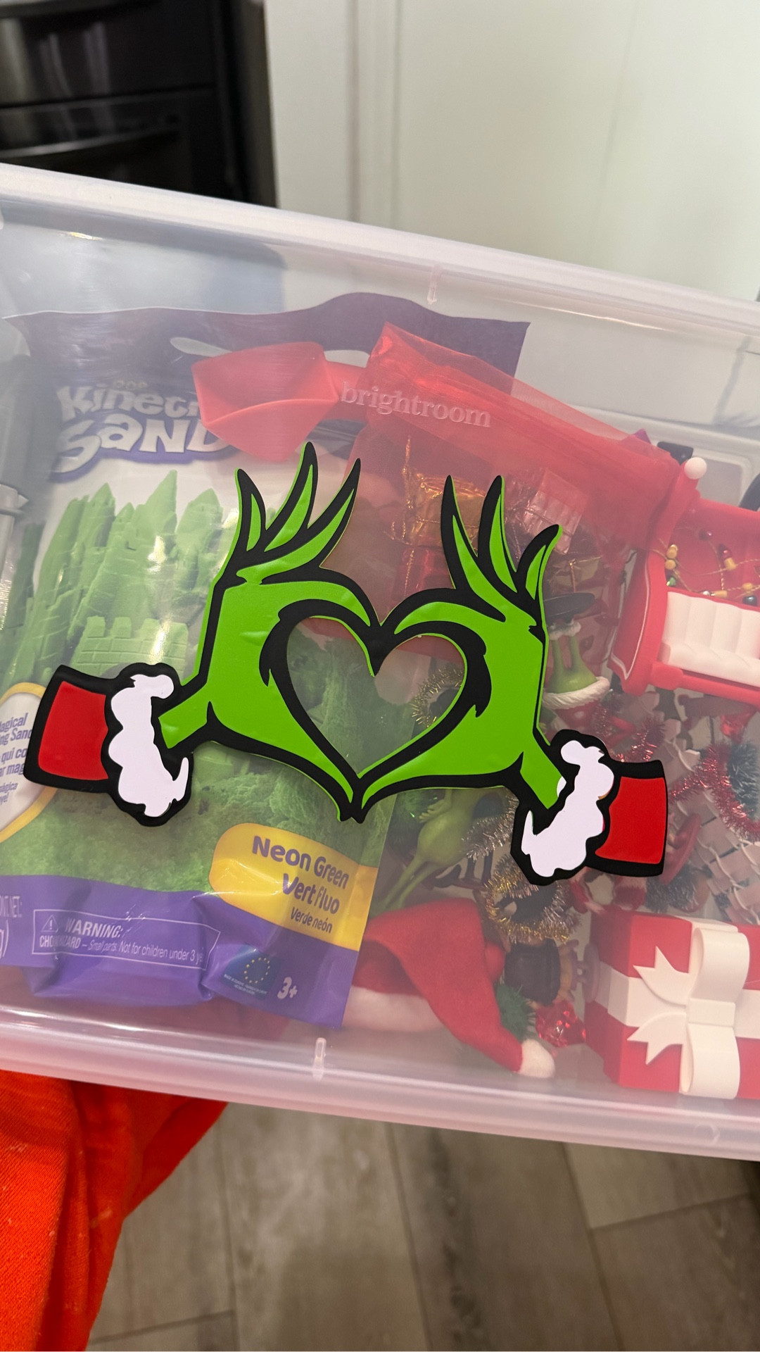 Created my own Christmas sensory bin. The Grinch is big in our house 😆