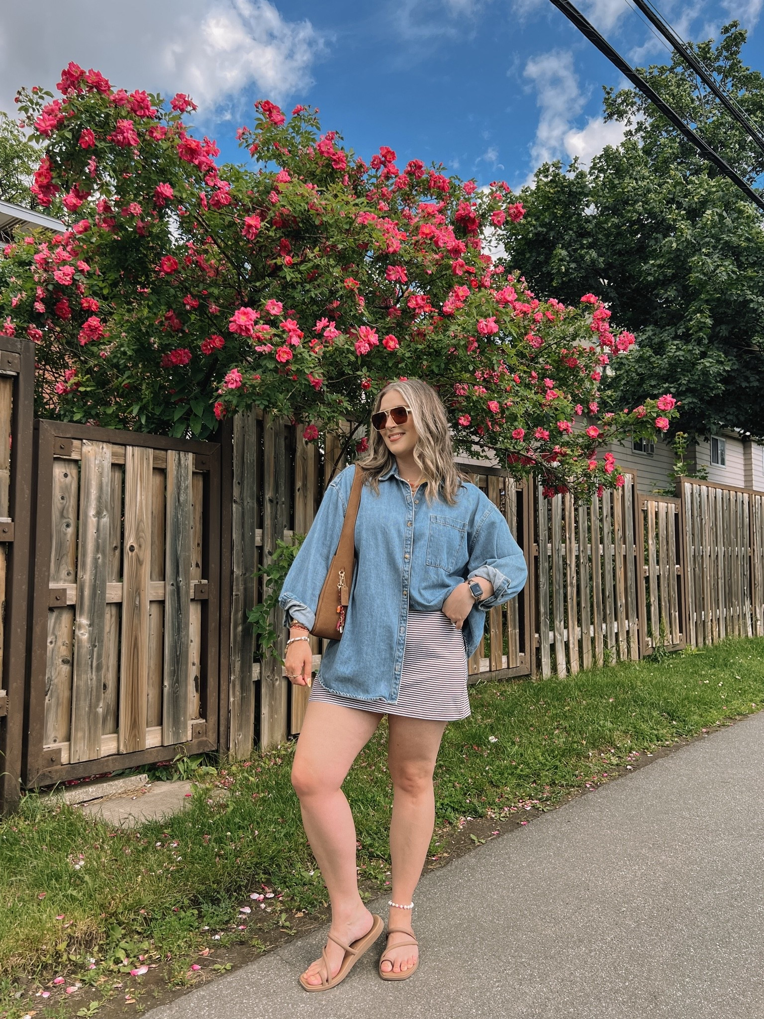 Simple summer outfit! Wearing my usual size L in the denim shirt and striped mini skirt (has built in shorts)! Crocs sandals are super comfy, I’m a 9.5-10 and wear a 10. Canadian shirt & Crocs links under “similar products”

#LTKsummer #LTKsale #LTKmidsize