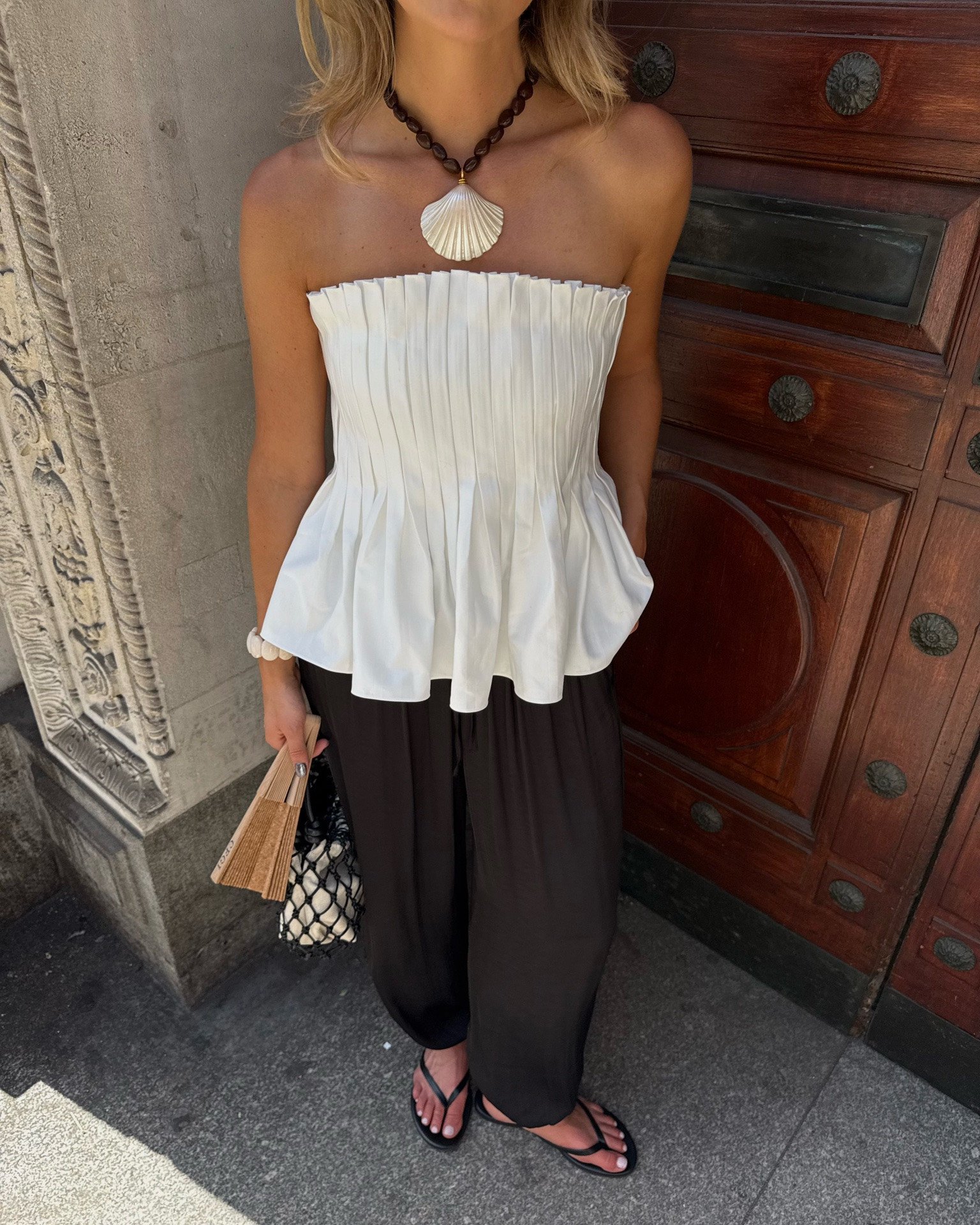 Heatwave outfit 🤍🖤🐚

Sezanne, white statement top, strapless top, summer top, white cotton top, satin baloon trousers, nobody’s child, black leather flip flops, shell necklace, holiday necklace, macrame bag, statement bag, holiday outfit, summer outfit

#LTKuk #LTKsummer #LTKeurope