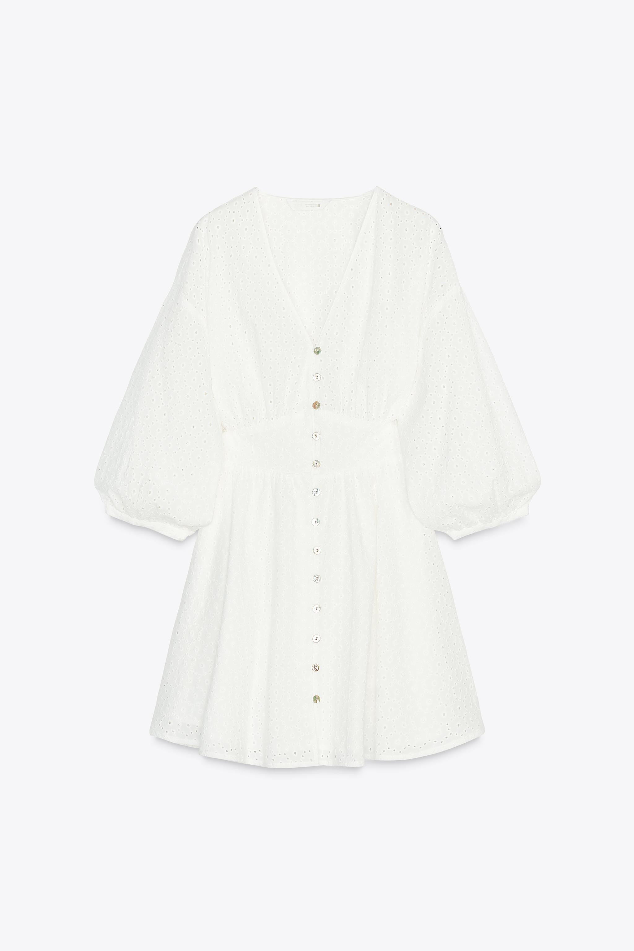 V-neck dress with below-the-elbow length sleeves. Fitted waist with smocked elastic back. Tonal e... | Zara US