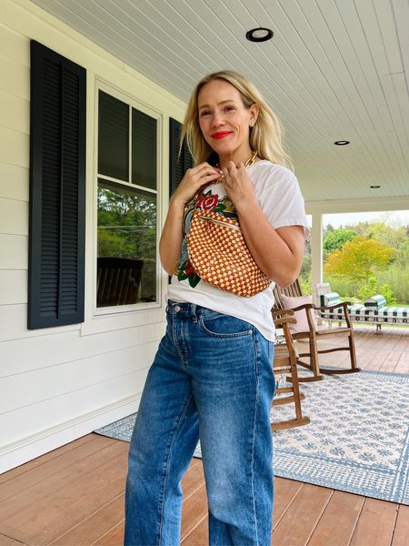 Everyday jeans and a tee but make it fun with a bold lip, baggy jeans, graphic tee, j.crew chunky gold necklace, a colored slide sandal, and patterned Clare v bag.

See more everyday casual outfits on CLAIRELATELY.com 

#LTKItBag #LTKSeasonal #LTKFindsUnder100