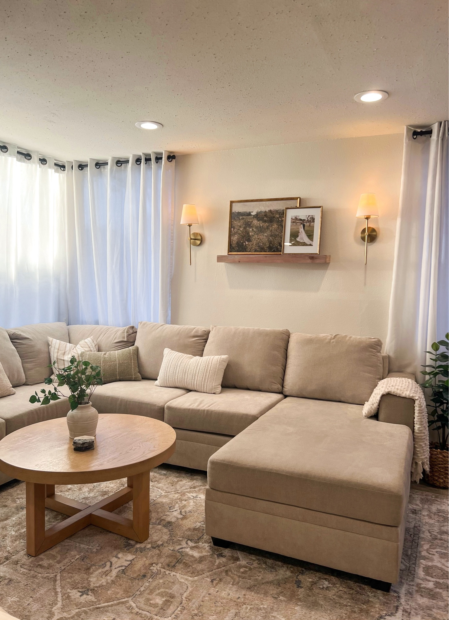 Organic modern living room, neutral home decor, wall sconces, beige couch 

#LTKHome