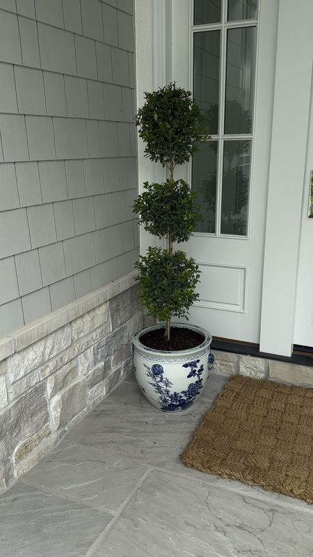 Our front garden is coming alive! I love these classic blue and white planters.  