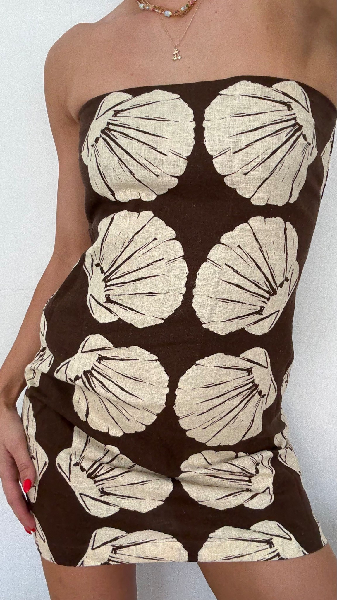 This dress SCREAMS beach trip. It’s probably the seashells lol. Love it so much  