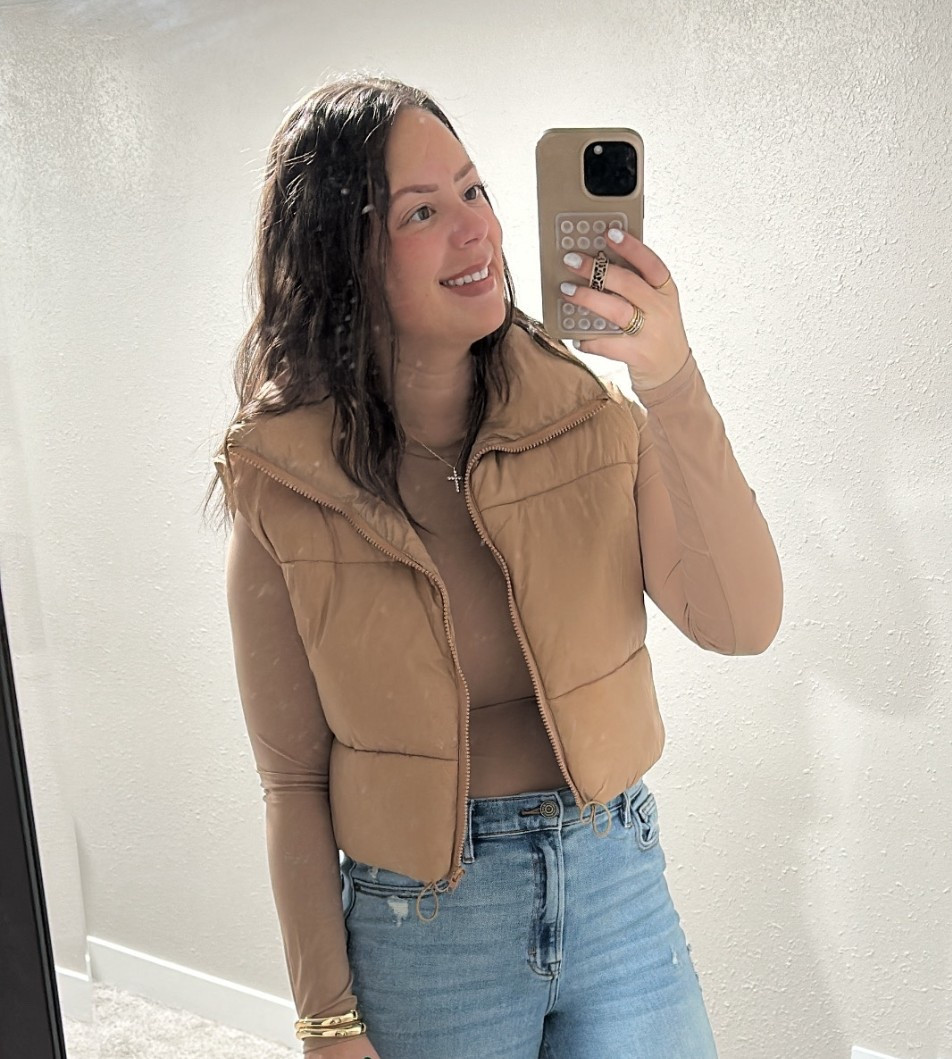 This vest is a must have! Love the cropped length. Comes in different colors, wearing my normal size medium. 

#LTKFindsUnder100 #LTKFindsUnder50 #LTKootd