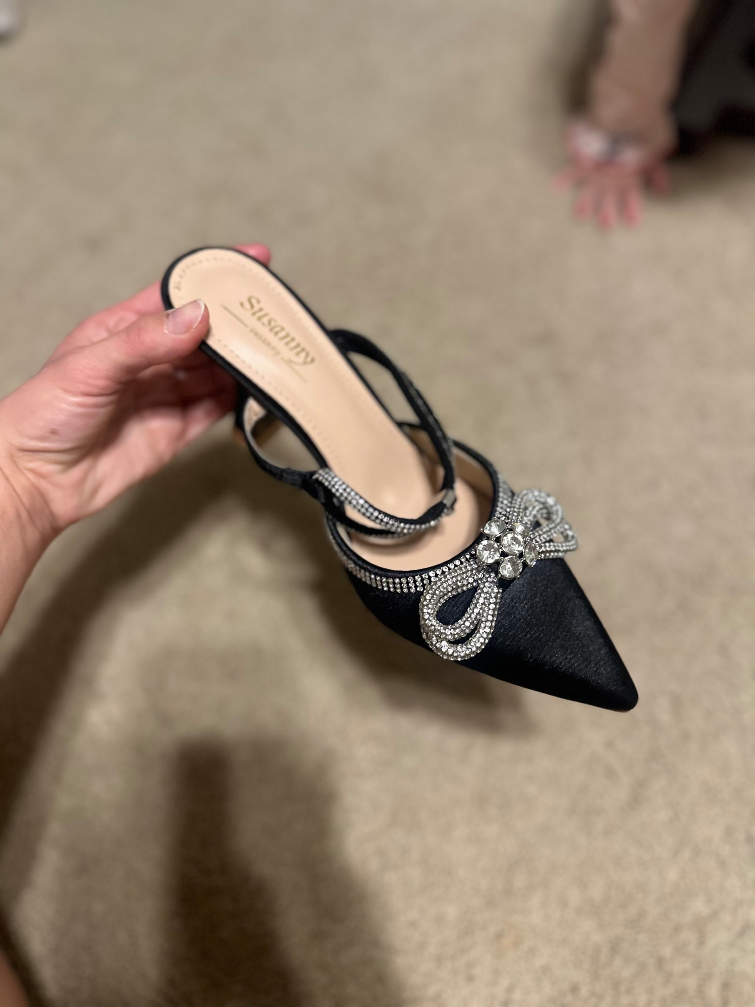 These black pointed-toe heels are such a good option for Christmas parties and NYE when you want something dressy but still wearable. The rhinestone bow adds a little sparkle without being too much, and they look really cute with dresses or dressy pants.

Fit tip: size up half a size

#LTKgrwm #LTKHoliday #LTKSeasonal