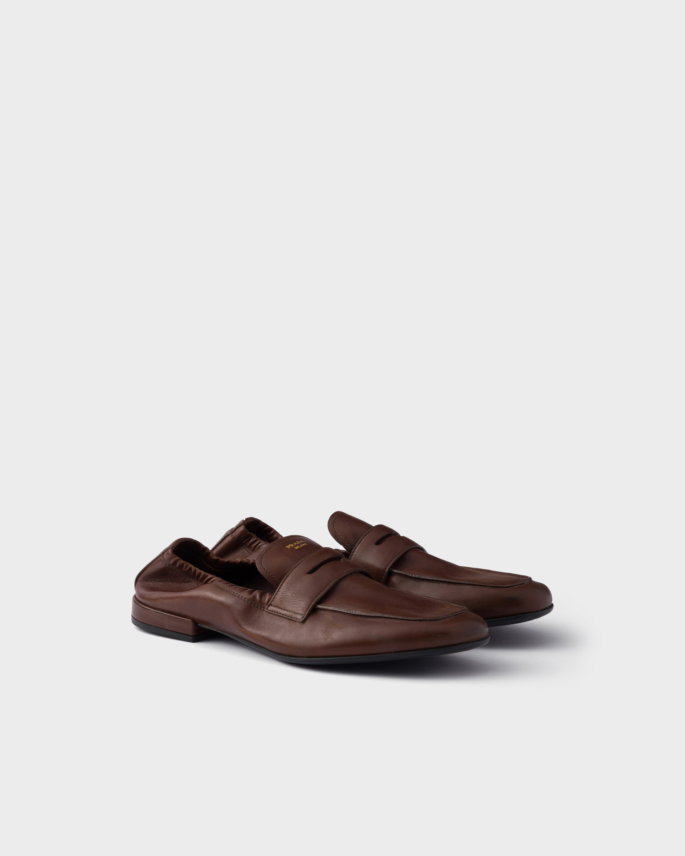 Shuffle antiqued leather loafers | Prada US