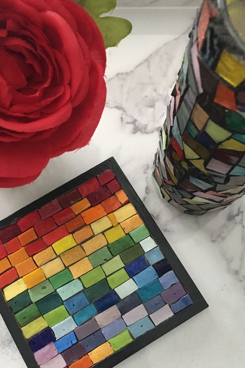 After making a mosaic trivet have you ever wondered why you would want to cover it with anything?🌈

It’s easy to make your own. All you need is a frame, adhesive, and smalti. No grout required!

For mosaic tips, tutorials, inspiration, and so much more please visit my YouTube channel: YouTube.com/julieweilbacher. 

Follow @julieweilbacher on Instagram for all things mosaic including mixed media mosaic, mixed media art, stained glass art, stained glass mosaic, murrini, millefiori, arts and crafts, studio organization, crafts organization, arts and crafts organization, art space, art studio, mosaic studio, mosaic workshop, art workshop, stained glass storage, mosaic tesserae, mosaic materials, mosaic tile, mosaic glass tile, glass tile, glass rods, stained glass, vitreous glass, mosaic home decor, mosaic wall art, mosaic mirror, mosaic projects, mosaic candle holder, mosaic votive, mosaic table, mosaic flower pot, mosaic crafts, beginner art, mosaic workshop, beginner mosaic, fine crafts, trivet, kitchen decor, coffee table decor, cute desk decor.

#LTKhome #LTKSeasonal #LTKFind