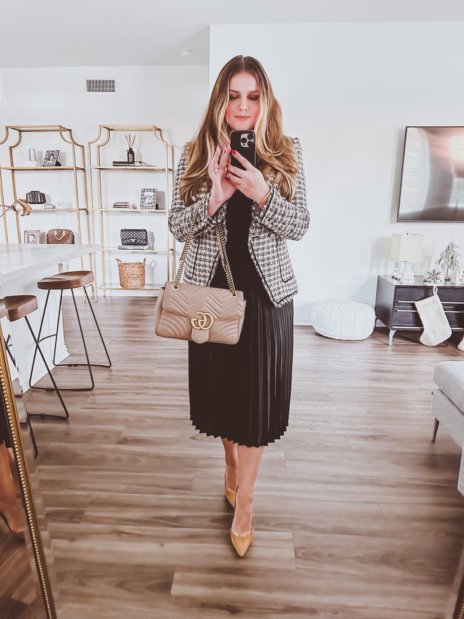 { amazed with the versatility of this black pleated skirt, from office to holiday party }

#LTKHoliday #LTKstyletip #LTKworkwear