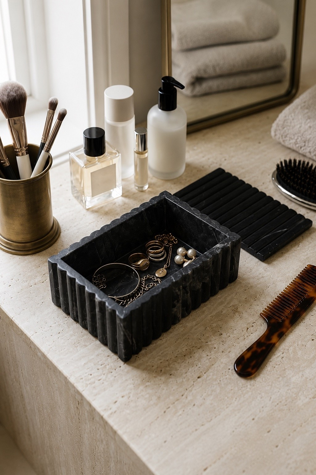 Now you can declutter your bathroom counter without sacrificing style. 

This decorative marble storage box is perfect for organizing jewelry, cosmetics, hair accessories, or keepsakes while adding a sophisticated touch to your vanity. 

Its timeless black stone finish complements modern, minimalist, and organic luxury interiors, making it an effortless Amazon home decor find.

bathroom counter organization, vanity organization, marble jewelry box, decorative storage box, bathroom decor, vanity decor, luxury home decor, neutral home decor, minimalist bathroom, bedroom organization, dresser decor, Amazon home finds, black marble decor, modern home accessories, countertop organization

#LTKHome #LTKselfcare #LTKBeauty