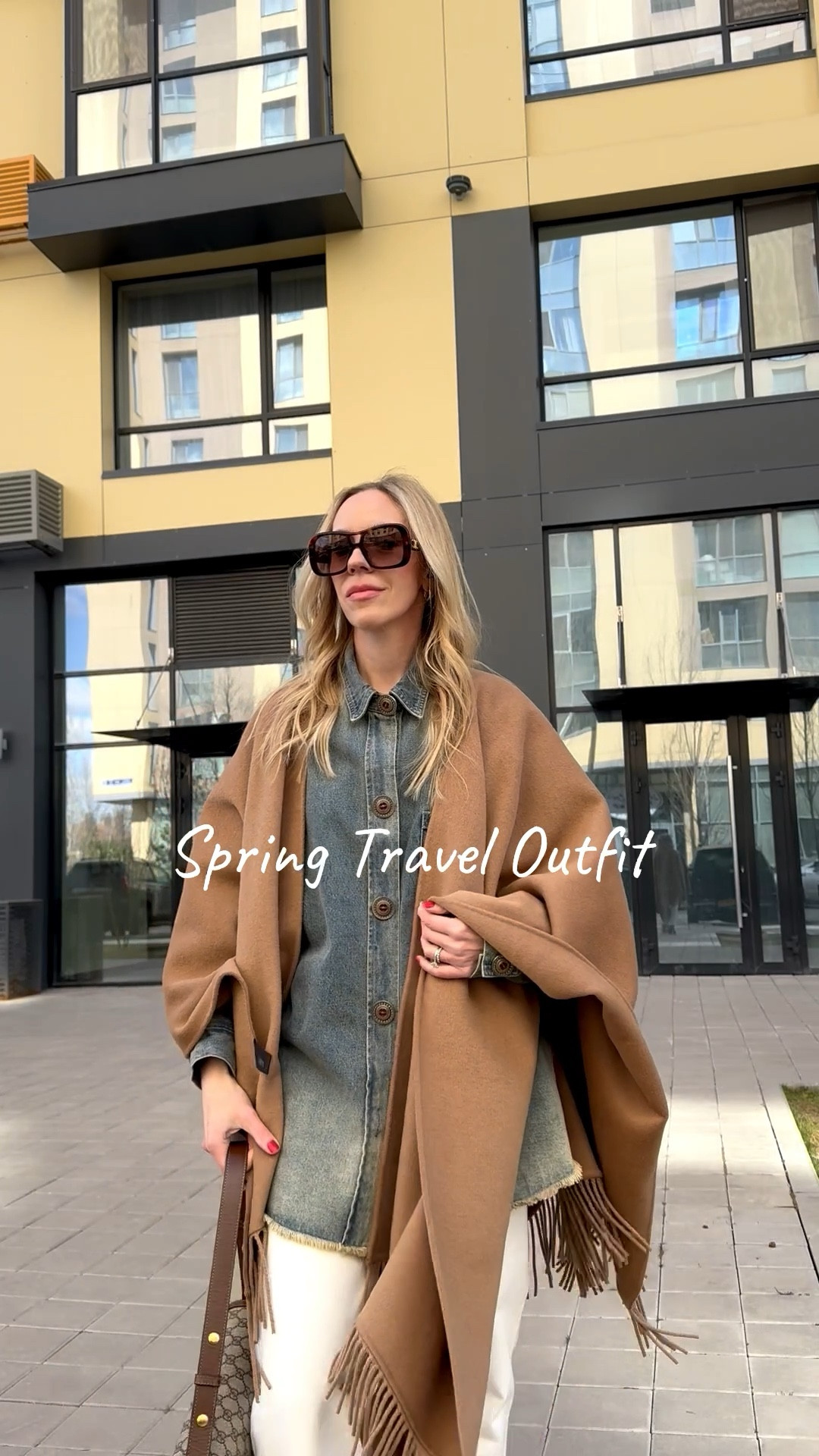 Spring travel outfit, camel cape, fringe, denim shirt, denim on denim, @levi white baggy 90’s jeans, cowboy boots spring outfit

#LTKOver40 #LTKTravel #LTKSaleAlert