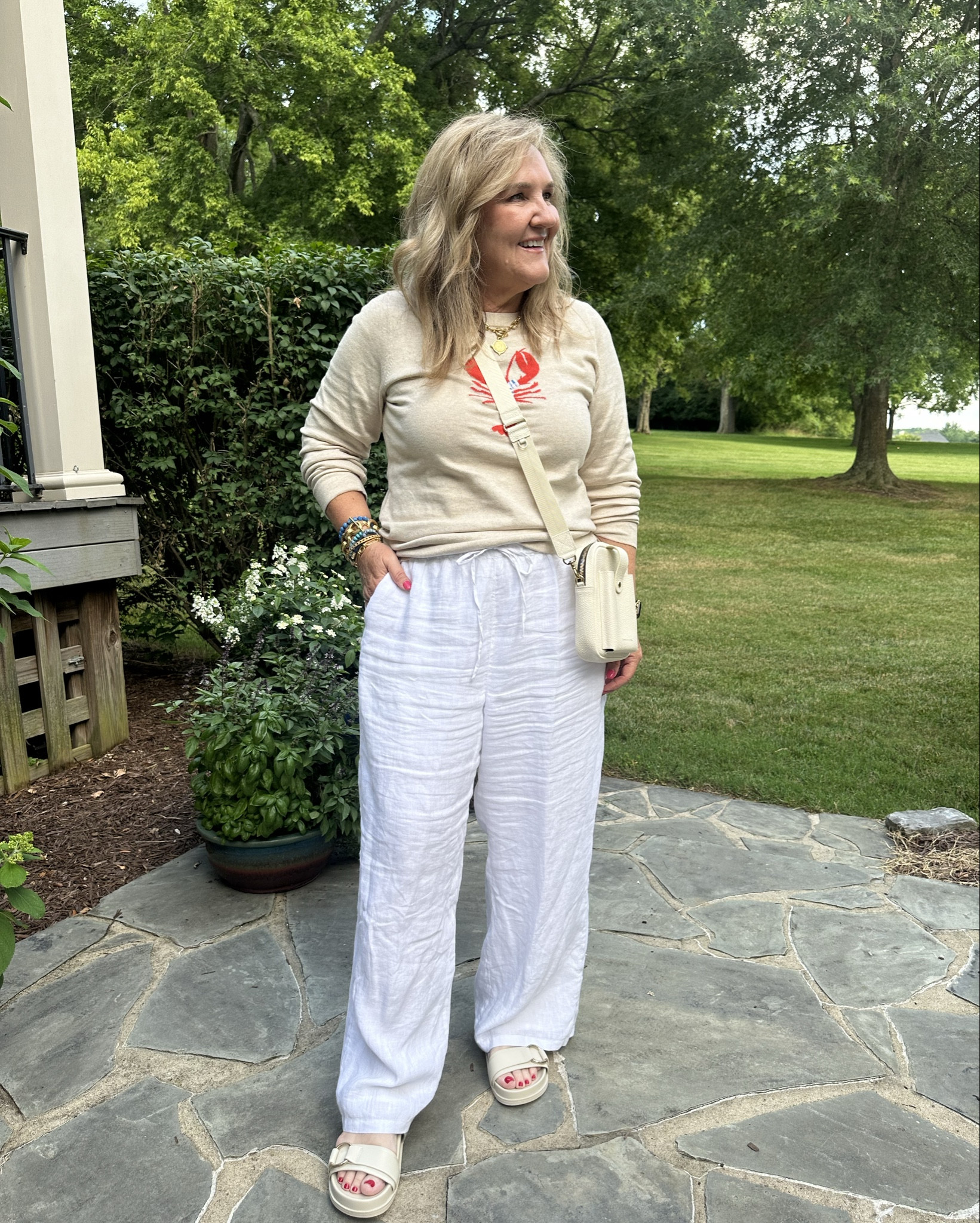 4th of July ready. Headed your way New England. This sequined lobstah spoke to me! Wearing a large. Size up if you want a looser relaxed fit. 
White linen pants these are my favorite. They are lined. 100% linen. Runs big. But that’s how it’s supposed to be. Wearing a large. 
New sandals. I’ve been looking at these!!! Finally bought them. There’s a faux leather I’ll link at target. 
Linking a similar bag. 

Linking the cutest little boy Outfit too. I’m grabbing it for my grandson. Also linking a few cute JCREW factory pieces  
JCREW linen pants 

#LTKOver40 #LTKSeasonal #LTKMidsize