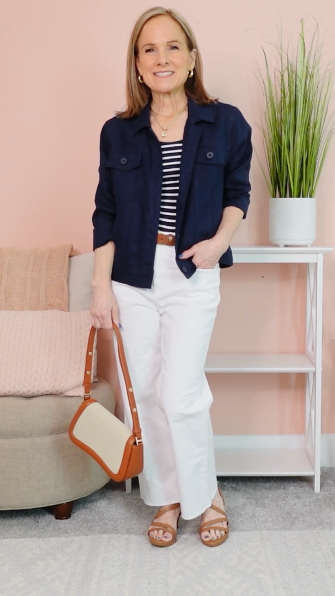 Very wearable trends, navy and stripes.  Pairing a solid over a stripe is a great way to incorporate stripes subtly.
White jeans are J.crew Kick Crop in a great petite length.  (2P)
Striped Tank from Amazon (S)
Navy Linen Jacket from Quince (S)
Bag from Amazon 

#LTKOver40 #LTKWatchNow #LTKPetite