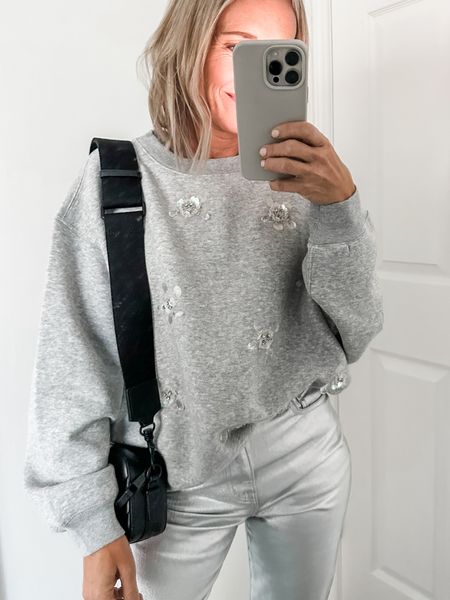 Silver
On sale- sweatshirt - I sized up to small
Silver denim- I sized down to 23- they do have some stretch as you wear


#LTKsalealert #LTKHoliday #LTKparties