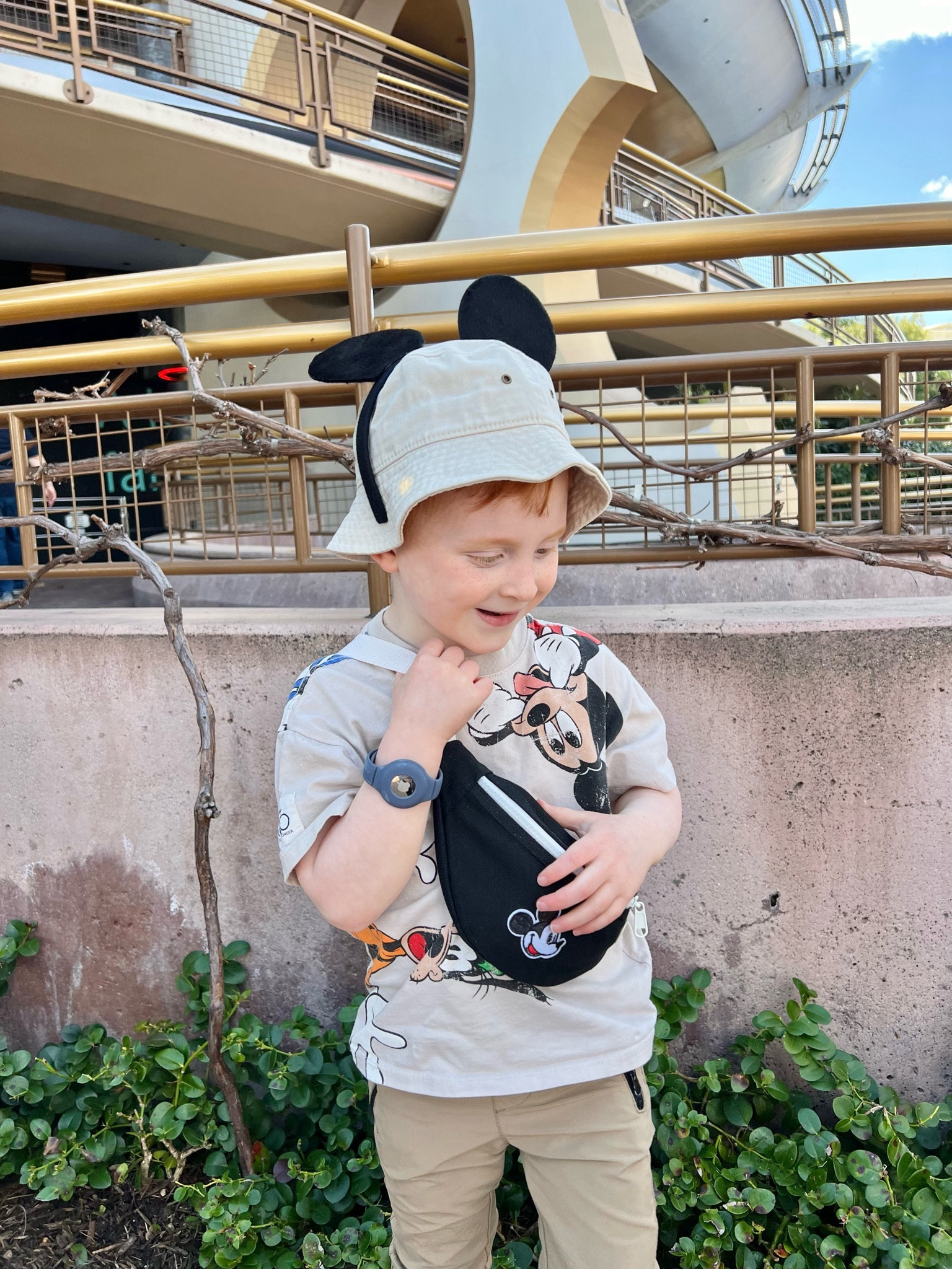 Neutral Disney Mickey boy styles with the perfect Fanny pack for snacks and goodies! 
We added the Mickey patch and I’m obsessed! 🤩 

Also, the AirTag with wristband was a must for our trip for keeping track of kids in busy crowds - that extra peace of mind! ✌🏻 

This shirt is older Cotton On, no longer available, but we linked some similar 
(We also bought the Target Mickey print! So affordable and cute!)

Check my other posts for outfits for the whole family
💛Becca 

#LTKkids #LTKtravel #LTKfindsunder50