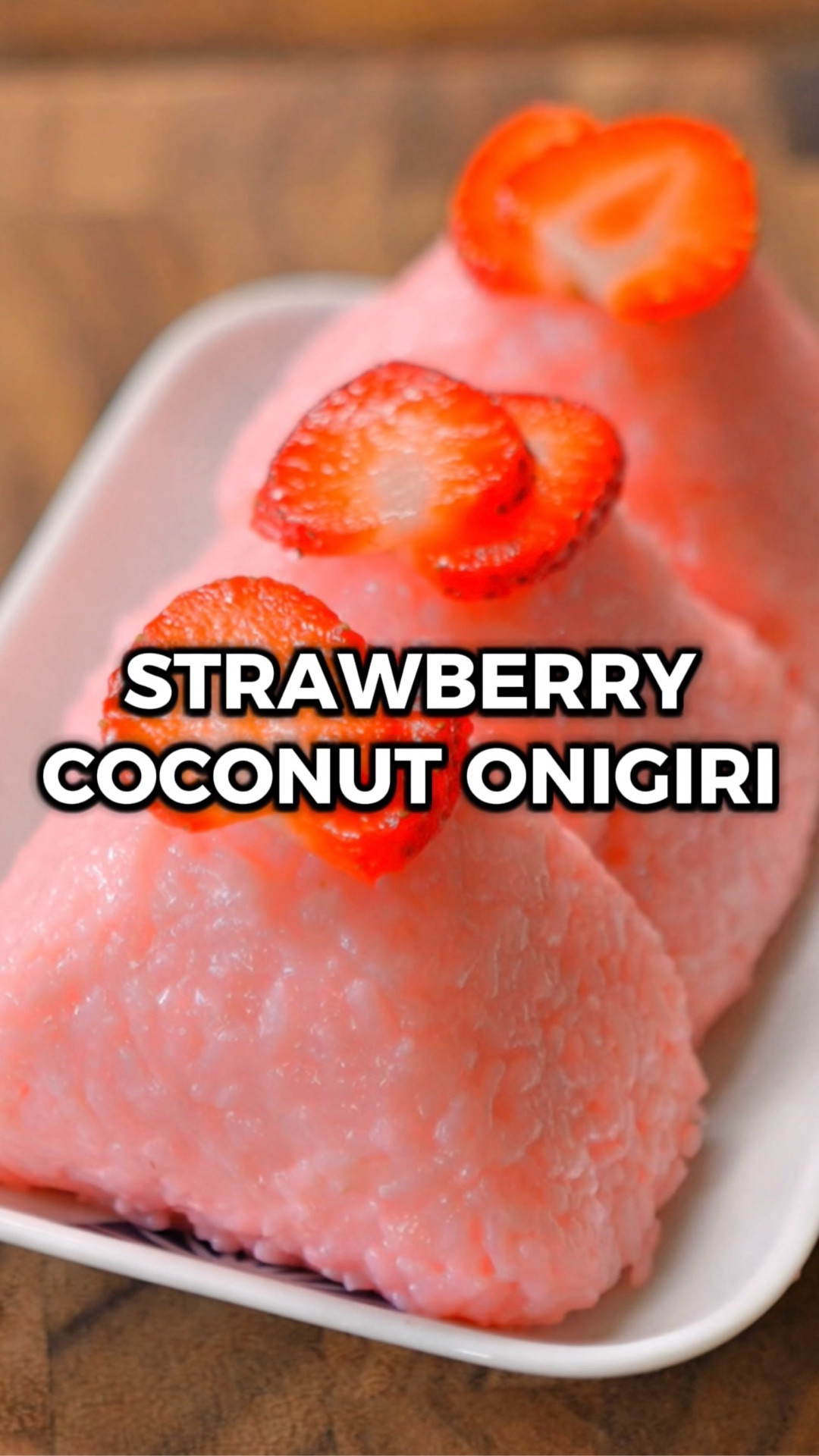 This is my new go-to summer dessert! 🍓🥥

I love onigiri (Japanese rice balls), and the idea for this tropical dessert version has been in the back of my mind for awhile now. And now that we’re heavy into summer, I figured it was the perfect time to try it out!

It’s a delicious rice ball made w/ short grain white rice that’s been soaked in a mixture of coconut milk and strawberry syrup so it absorbs ALL that flavor. Then, you just make rice balls with chopped fresh strawberries in the middle.

Would you try them?? Let me know in the comments what you think if you do! 🙌

INGREDIENTS (3 onigiri)
3 instant white rice cups (~22 oz cooked)
1 can coconut milk
1/4 cup strawberry syrup
1 tsp cornstarch
7 strawberries (chopped)

INSTRUCTIONS:
1️⃣ Put the rice cups in the microwave per the packaging instructions. If you’re using a rice cooker, just cook the rice as normal.

3️⃣ Pour the coconut milk and strawberry syrup into a small sauce pan over medium heat, stirring consistently, and bring it to a simmer. Take a few tsp of the coconut milk and mix it with the cornstarch, then pour it into the pot and keep stirring. Take it off the heat and set aside.
4️⃣ Put the cooked rice into a large mixing bowl and pour the coconut milk mixture over the top. Use a silicone spatula or wooden spoon to mix it all up. Then, put plastic wrap over the bowl and let it rest at room temperature for 45 minutes to an hour. You want the rice to pretty much completely absorb the liquid.
5️⃣ While you wait, finely chop 6 of the strawberries. Cut the stem off the 7th, and set it down on your cutting board with the pointy end facing up. Make slices straight down so you get thin, flat slices of strawberry.
6️⃣ Fluff the rice a little. Grab a handful and flatten it into a disk on your palm. Take some of the finely chopped strawberries and put it in the center of the disk. Take another handful of rice and place it on top, and squeeze and roll it in your hands to form a rice ball. Optionally, you can shape it into a triangle. 
7️⃣ Top with 1-2 slices of strawberry, and enjoy!

#LTKFamily #LTKHome #LTKParties