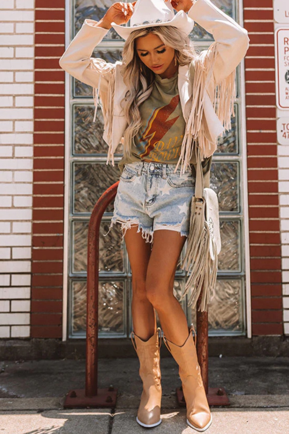I’m just going to be honest… I need this entire outfit pronto!! I mean the tan fringe jacket, graphic tee, denim shorts, and tan boots are just amazing✨✨✨

#LTKSeasonal #LTKshoecrush #LTKunder100