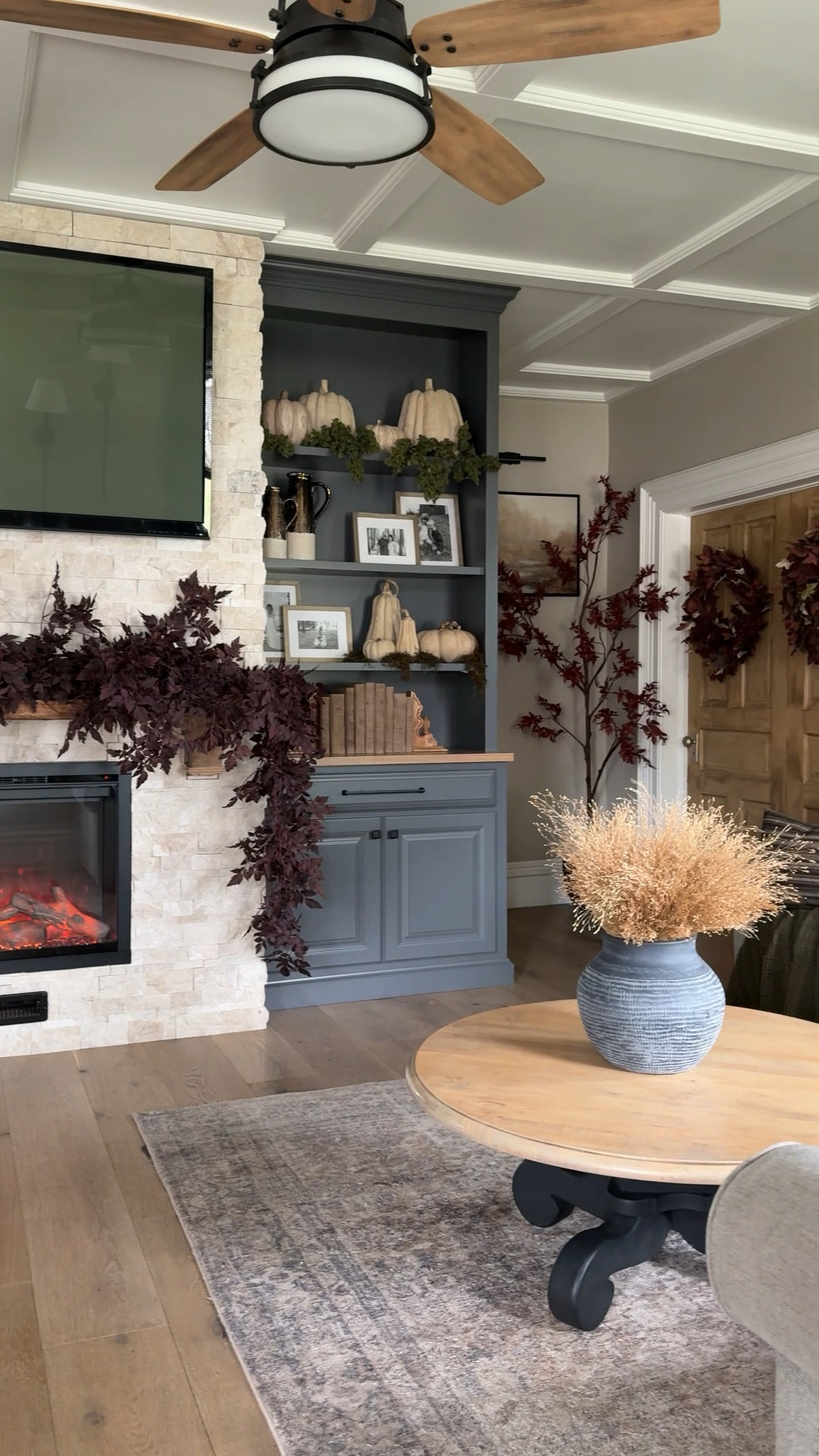 Fall Living Room Decor | Shelf Styling | Mantle Garland | Neutral Pumpkins | Wood Grain Pumpkins | Fall Stems | Branches | Wreath | Faux Tree | 

#LTKHome #LTKSeasonal