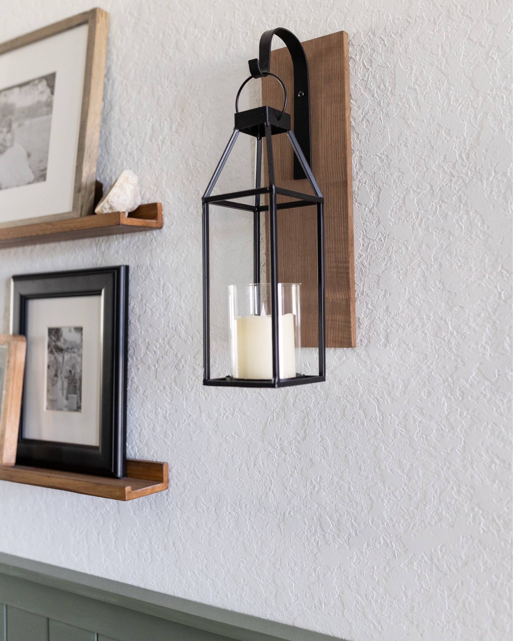 Obsessed with these candle lanterns/sconces! I have two framing the picture ledge in our hallway.

#LTKHome